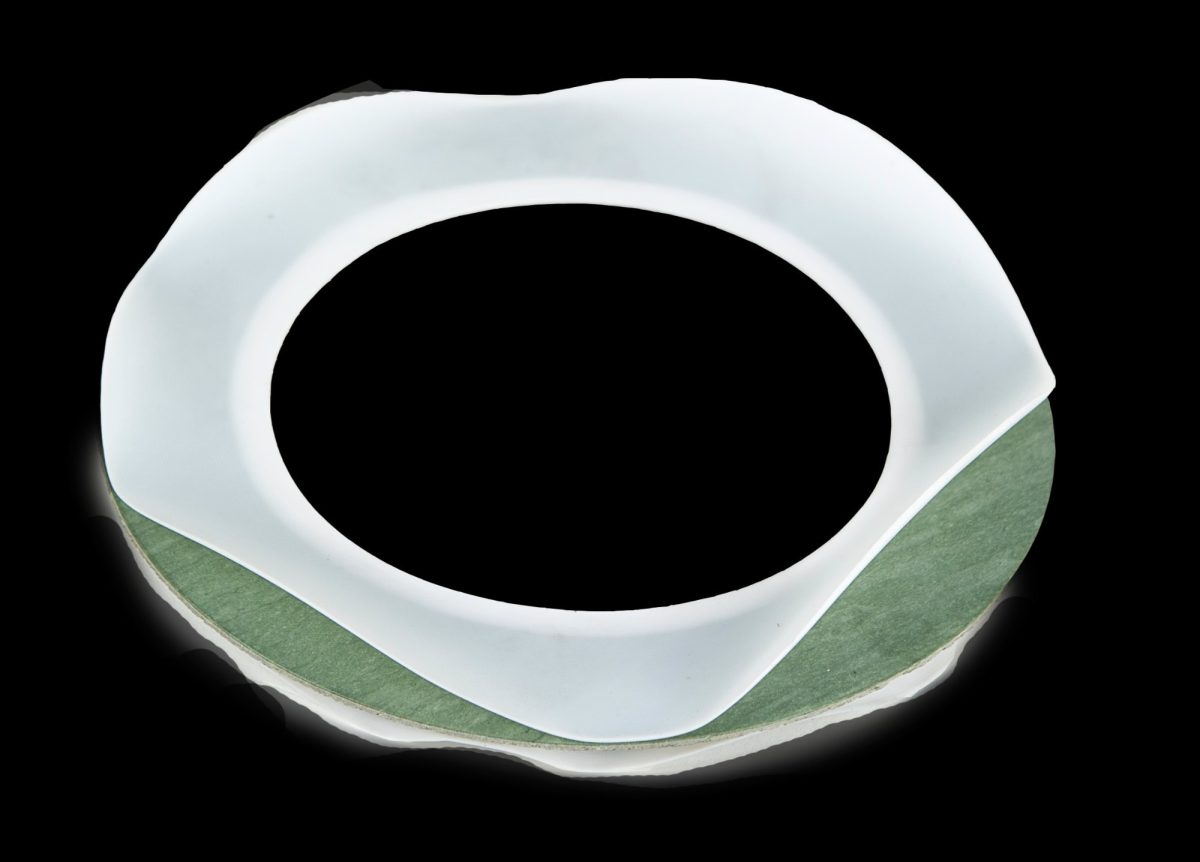 PTFE envelope gasket with a white PTFE jacket over a CNAF filler core for corrosive chemical flange joints