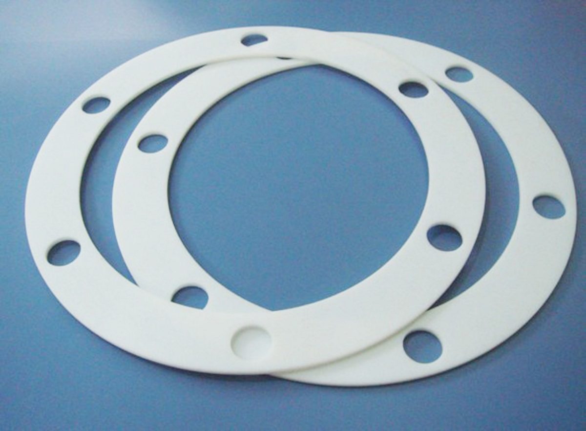 White expanded PTFE full face gaskets with bolt holes for flange joints in corrosive chemical service